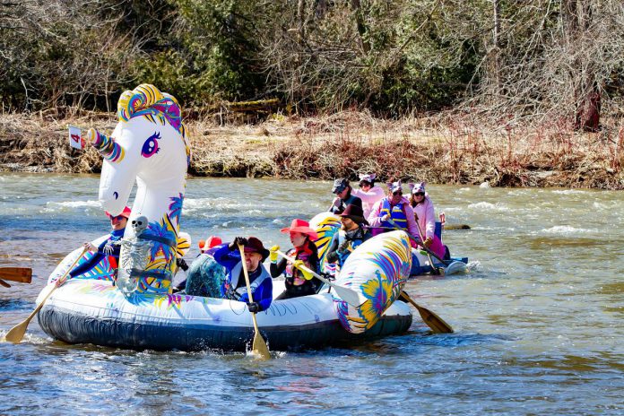 "Float Your Fanny Down the Ganny" is returning to Port Hope on April 13, 2024, although the Crazy Craft race will not take place this year due to the closure of the Sylvan Glen Bridge for replacement. Instead, there will be a shorter "Floaty Your Fanny" race where participants will use inflatable floaties from Optimist Park to Fanneyvile. However, all other elements of the event will continue, including prizes and awards, the Fannyville outdoor event village, and more. (Photo: Float Your Fanny Down the Ganny website)