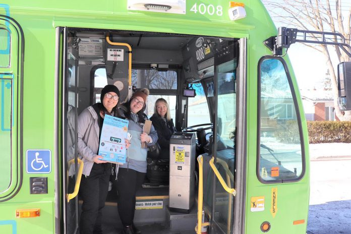GreenUP's program director Natalie Stephenson and active school travel program coordinator Ashley Burnie with Peterborough Transit driver Sue during a Grade 8 Transit Quest  orientation before March Break. (Photo: Jessica Todd / GreenUP)