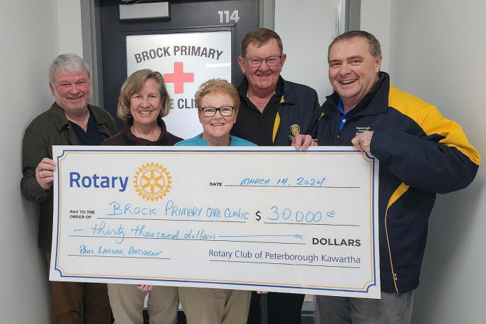 The Rotary Club of Peterborough Kawartha has donated $30,000 to help fund the cost of building a patient bathroom at the Brock Primary Care Clinic in downtown Peterborough, which offers primary medical care for anyone experiencing homelessness. Pictured from left to right are Brock Mission executive director Bill McNabb, Brock Primary Care Clinic co-founders Dr. Janet Kelly and nurse practitioner Lee-Anne Quinn, Kawartha Rotary major projects chair Brian O'Toole, and Kawartha Rotary president elect Dean Ostrander. (Photo courtesy Rotary Club of Peterborough Kawartha)