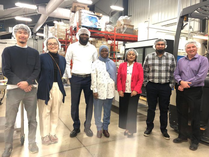 Ontario Agri-Food Venture Centre operations specialist Neil Horner (far right) with Newcomers' Food Entrepreneur Pitch Competition participants, from left to right, Takahiro Takehana and Madoka Takehana of 'Pastry Kukki' in Cobourg, Dawood Abdulsalam and Kabirat Agunbiade of Ottawa (who won the competition with their 'Harvestroot Blend' product), and Sabrina Zaman and Nafis Muntasir of '& Natural' in Bowmanville. Not pictured is Rajesh Kumar of 'Pinni, Healthy Harmony' in Toronto. (Photo: Northumberland County)
