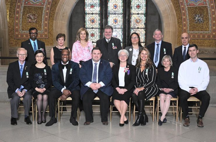 The recipients of the Ontario Medal for Good Citizenship for 2021 and 2022, including Hastings resident Carrie Hayward (back row, second from left), with citizenship and multiculturalism minister Michael Ford (front row, fourth from left) and lieutenant governor Edith Dumont (front row, fourth from right) at the Royal Ontario Museum in Toronto on March 25, 2024. (Photo: Office of Michael Ford)