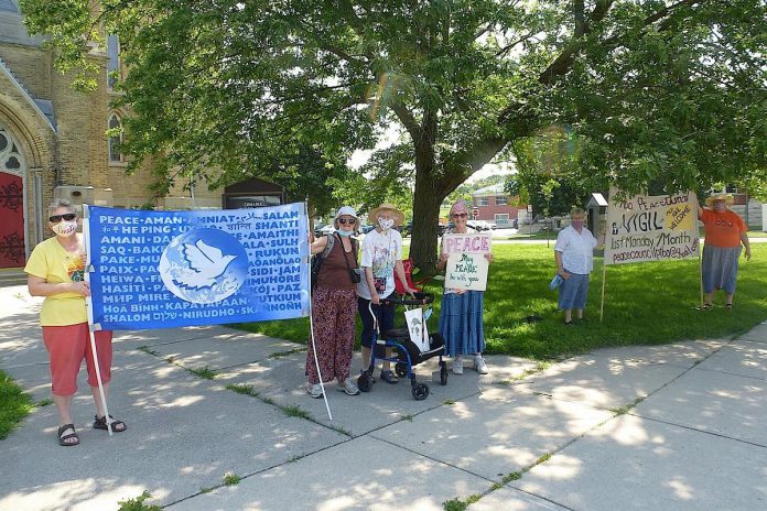 For nine years, the Peterborough Peace Council has held a monthly peace vigil at noon at the corner of George and MacDonnel streets. The vigil will begin its 10th year on March 25, 2024. (Photo: Peterborough Peace Council)