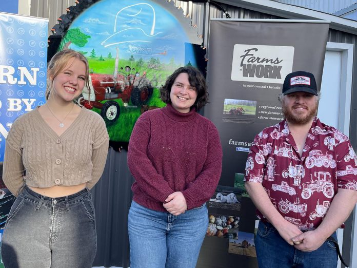 Peterborough 4-H member Ella Doris, Farms at Work manager Emma Macdonald, and farmer and auctioneer Jason McIntosh anticipate an upcoming online auction to benefit the farm communities of Peterborough and the Kawarthas. (Photo courtesy of Farms at Work)