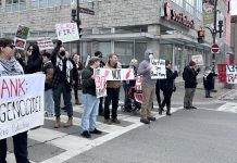 Around 50 protesters gathered at the Scotiabank branch at Hunter and Water streets in downtown Peterborough on March 15, 2024 to demand the bank's asset management arm fully divest its holdings in Elbit Systems Ltd., an Israeli defence contractor. (Photo: Nogojiwanong 2 Palestine)