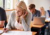 A mature female student in a classroom. (Stock photo)