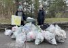Nancy Cockburn and Jenn McCallum, co-founders of the Ashburnham Memorial Stewardship Group, pictured with garbage collected on Armour Hill in Peterborough on April 13, 2024. (Photo: John Hauser)