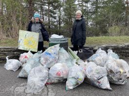 Nancy Cockburn and Jenn McCallum, co-founders of the Ashburnham Memorial Stewardship Group, pictured with garbage collected on Armour Hill in Peterborough on April 13, 2024. (Photo: John Hauser)