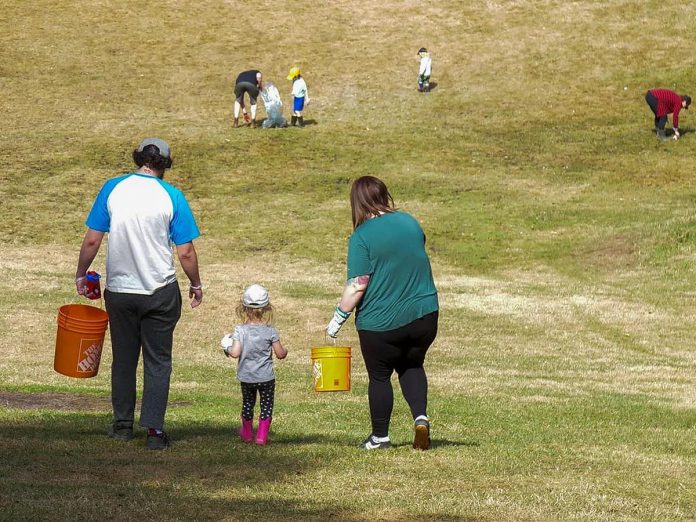 Families participating in the April 2023 clean-up event at Ashburnham Memorial Park. (Photo courtesy of Ashburnham Memorial Stewardship Group)