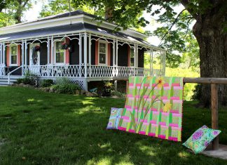 The Blocks and Blooms event on June 15, 2024 hosted by the Millbrook Cavan Historical Society is a self-guided tour where visitors can learn about historical properties in the area while enjoying abundant gardens and seeing a display of vibrant contemporary and heirloom quilts. Built in 1837, the Ontario or Regency Cottage at 3 Bank Street is likely the oldest surviving house in Millbrook. The preserved one-and-a-half-storey home is one of the heritage properties included in the tour. (Photo courtesy of Millbrook Cavan Historical Society)