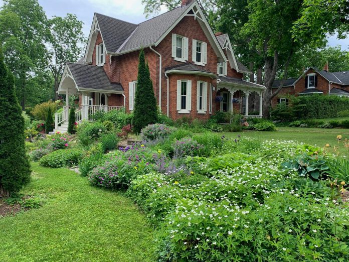 Located at 5 Prince Street in Millbrook, the Williams House is not only a Victorian vernacular home with history dating back to the mid-1800s, but it also boasts a luscious and abundant garden that will be one of many stops along the Blocks and Blooms event on June 15, 2024 hosted by the Millbrook Cavan Historical Society. (Photo courtesy of Millbrook Cavan Historical Society)