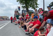 A crowd along George Street in downtown Peterborough during the 2023 Canada Day parade. (Photo: City of Peterborough / Facebook)