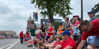 A crowd along George Street in downtown Peterborough during the 2023 Canada Day parade. (Photo: City of Peterborough / Facebook)
