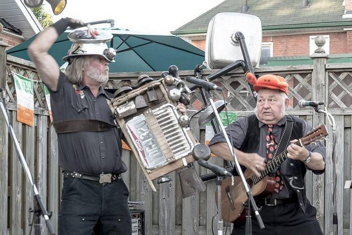 Washboard Hank and Reverend Ken reprise their musical novelty act from the 1970s at the Stone Hall in Havelock on April 28, 2024. (Facebook photo)