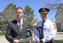 Peterborough police held a media conference on April 26, 2024 to provide an update on the investigation into a shooting earlier that morning at the Sunshine Homes housing complex at 572 Crystal Drive that resulted in the death of a 32-year-old Peterborough man. (kawarthaNOW screenshot of Peterborough police video)