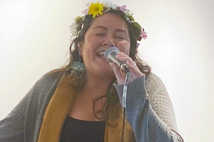 Missy Knott, the 2009 recipient of the Peterborough Folk Festival's Emerging Artist Award, performed a kick-off event on April 4, 2024 at the Market Hall the festival's return to Nicholls Oval Park on August 18 and 19. She said the award, included a trip to the Ontario Folk Festival Conference, was a "springboard" early in her music career. (Photo: Paul Rellinger / kawarthaNOW)