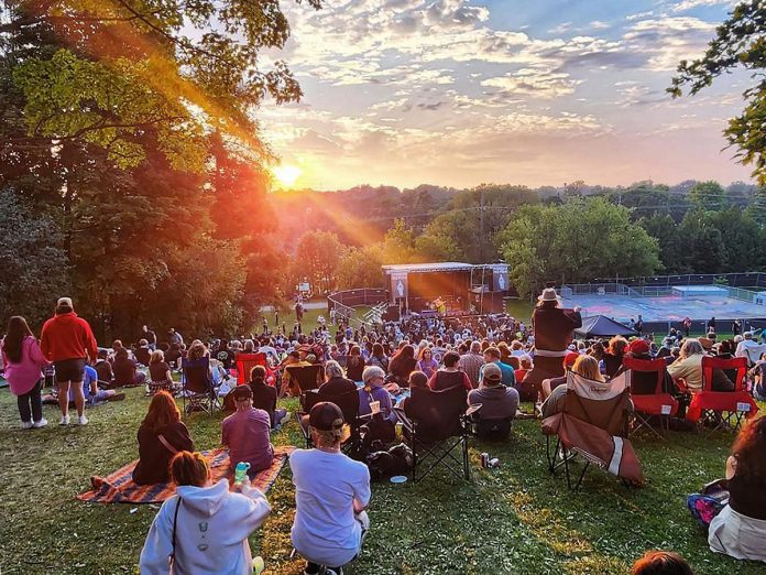 The crowd at Nicholls Oval Park in Peterborough in August 2023 watching Juno award winner Dan Mangan perform at the 35th annual Peterborough Folk Festival. The free-admission festival returns to the park on August 17 and 18, 2024. (Photo courtesy of Peterborough Folk Festival)