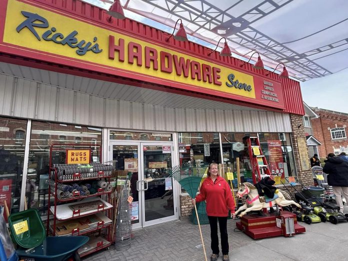 Nancy Britton of Millbrook Home Hardware in front of the store, which was transformed into Ricky's Hardware Store during the filming of a third-season episode of the popular Amazon Prime Video action-thriller series in downtown Millbrook on April 23, 2024. (Photo: Millbrook Home Hardware / Facebook)
