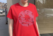 Niijkiwendidaa Anishnaabekwewag Services Circle in honour of National Day of Awareness for Missing and Murdered Indigenous Women, Girls, and 2-Spirit People, also known as Red Dress Day. Nish Tees owner James Hodgson is selling red T-shirts with a design by Métis-Japanese Canadian artist Mia Ohki. (Photo courtesy of Nish Tees)