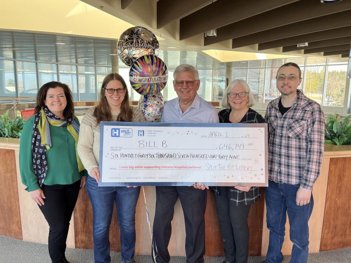 Toronto resident Bill B. (middle) with a $646,749 cheque representing the grand prize in the Split the Pot Lottery, a joint venture of 51 hospital foundations across Ontario including the Ross Memorial Hospital Foundation in Lindsay. Also pictured from left to right are foundation CEO Erin Coons, Bill's daughter Laura, Bill's wife Debbie, and Bill's son-in-law Adam. (Photo courtesy of Ross Memorial Hospital Foundation)