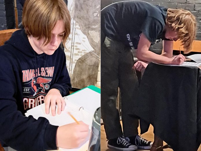 Actors Brogan McKellar and Lucas Pronk make notes on their scripts during early rehearsals for "Tide of Hope", Trent Valley Archives Theatre's inaugural history play being staged at Market Hall Performing Arts Centre on May 15 and 16, 2024. (Photos courtesy of Trent Valley Archives Theatre)