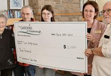 Sarah Joore of The Gardens of Peterborough Retirement Residence (second from right) presented a $3,000 sponsorship cheque to Trent Valley Archives board of directors president Steve Guthrie (right) on March 28, 2024 in support of Trent Valley Archives Theatre's inaugural history play "Tide of Hope" to be performed in May. Also pictured from left to right are Trent Valley Archives Theatre co-producers Mary and Greg Conchelos and Trent Valley Archives board vice-president Madison More. (Photo: Edward Schroeter)