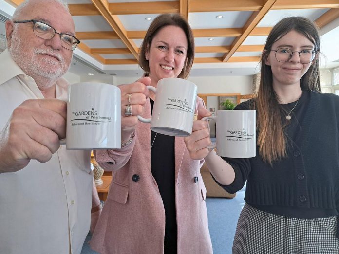 Trent Valley Archives board of directors president Steve Guthrie and vice-president Madison More (right) raise The Gardens of Peterborough Retirement Residence mugs with Sarah Joore of The Gardens of Peterborough in appreciation of a $3,000 sponsorship donation from The Gardens to Trent Valley Archives for the inaugural history play of Trent Valley Archives Theatre. A private performance of "Tide of Hope" will be staged for residents of The Gardens on May 9, 2020 prior to two public performances of the play at Market Hall Performing Arts Centre on May 15 and 16. (Photo: Edward Schroeter)