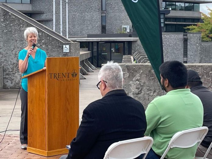 Lois Tuffin, chair of Volunteer Peterborough's steering committee and a longtime volunteer herself, at the podium at Trent University during the official launch event of Volunteer Peterborough in September 2023. The organization's goal is to overcome barriers to volunteerism by matching a person's skillset and interests with opportunities available at community organizations. (Photo: Jhane Brasier)