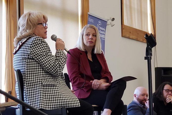 Peterborough County Warden Bonnie Clark (left) responds to a question as Peterborough and Kawarthas Chamber of Commerce president and CEO Sarah Budd looks on at the Chamber's Warden's Breakfast event held at Lang Pioneer Village Museum in Keene on April 23, 2024. (Photo: Jeannine Taylor / kawarthaNOW)