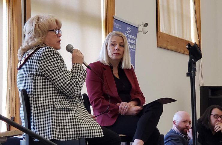 Peterborough County Warden Bonnie Clark (left) responds to a question as Peterborough and Kawarthas Chamber of Commerce president and CEO Sarah Budd looks on at the Chamber's Warden's Breakfast event held at Lang Pioneer Village Museum in Keene on April 23, 2024. (Photo: Jeannine Taylor / kawarthaNOW)