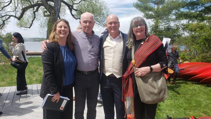 Canadian Canoe Museum executive director Carolyn Hyslop, Globe and Mail columnist Roy MacGregor, Canadian Canoe Museum curator Jeremy Ward, and broadcast journalist Shelagh Rogers at the grand opening celebration of the new Canadian Canoe Museum on May 11, 2024. MacGregor and Rogers are both members of The Canadian Canoe Museum’s National Council. (Photo: Jeannine Taylor / kawarthaNOW)