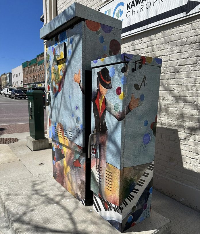 Chosen for the City of Kawartha Lakes' "That's a Wrap" public art program in 2023, "Lovin the Limelight" by Kirkfield artist Joy McCallister is wrapping the traffic control box at the intersection of Kent and Lindsay streets in Lindsay. (Photo courtesy of City of Kawartha Lakes)