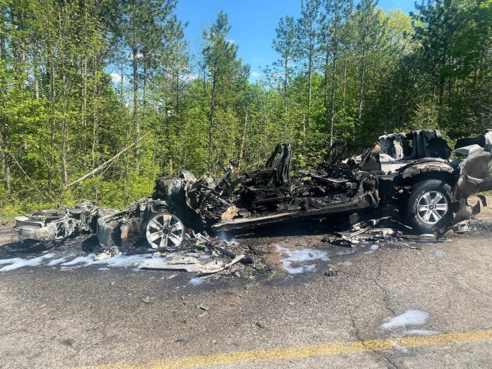 Peterborough County OPP released this photo of the remains of a pickup truck and a motorcycle after they caught on fire following a head-on collision on County Road 507 north of Buckhorn on May 19, 2024. The motorcyclist was pronounced dead at the scene and the two occupants of the pickup truck escaped with minor injuries. (Photo: Peterborough County OPP)