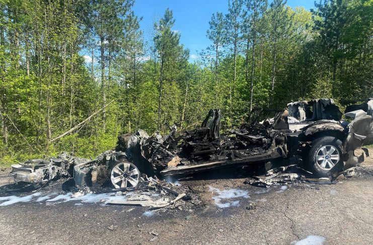 Peterborough County OPP released this photo of the remains of a pickup truck and a motorcycle after they caught on fire following a head-on collision on County Road 507 north of Buckhorn on May 19, 2024. The motorcyclist was pronounced dead at the scene and the two occupants of the pickup truck escaped with minor injuries. (Photo: Peterborough County OPP)