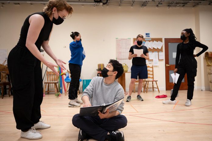 Director Fiona Sauder (left) consults with actor Haneul Yi during a rehearsal of the Capitol Theatre's production of the family musical "A Year with Frog and Toad", running for 17 performances from May 17 to June 2, 2024 at the historic venue in downtown Port Hope. (Photo: Sam Moffat)