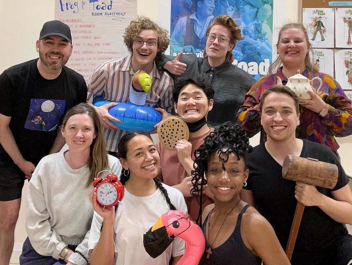 The cast and crew of the Capitol Theatre's production of "A Year with Frog and Toad" including actor Ben Page (back row, second from left), director Fiona Sauder (back row, second from right), actors Haneul Yi as Toad and Joel Cumber as Frog (middle row, right), and actors Yunike Soedarmasto and Taylor Lovelace (front row). The family musical runs for 17 performances from May 17 to June 2, 2024 at the historic venue in downtown Port Hope. (Photo courtesy of Capitol Theatre)