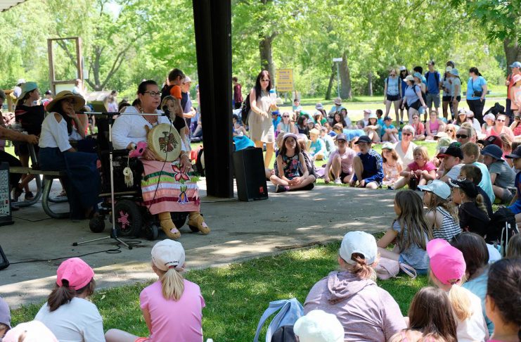 Elder Dorothy Taylor of Curve Lake First Nation leads a sacred water teaching at the Peterborough Children's Water Festival in 2023. (Photo: Lili Paradi)