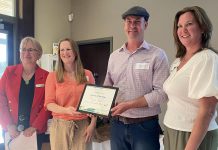 Emily and Norm Lamothe of Cavan's Woodleigh Farms received the "Rookie of the Year" award at Green Economy Peterborough's third annual Leadership in Sustainability Awards on May 16, 2024. Also pictured are Jackie Donaldson (left) of Green Economy Peterborough and Karen Lynch of Peterborough County. (Photo: Natalie Stephenson / GreenUP)