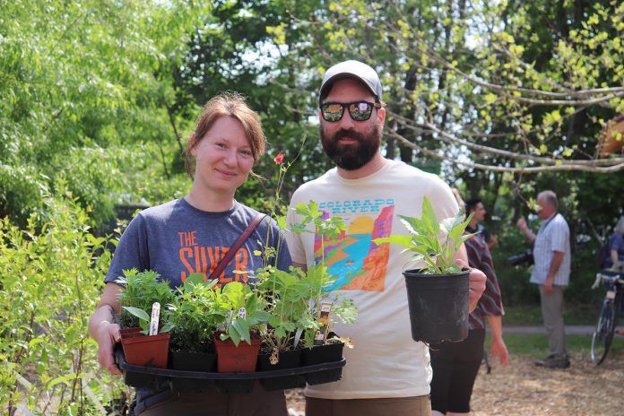 Happy customers with their new native plants during the annual spring opening event at GreenUP's Ecology Park Native Plant & Tree Nursery in May 2022. In 2024, the event takes place from from 10 a.m. to 4 p.m. on Saturday, May 18th. (Photo: Jessica Todd / GreenUP). Todd/GreenUP)