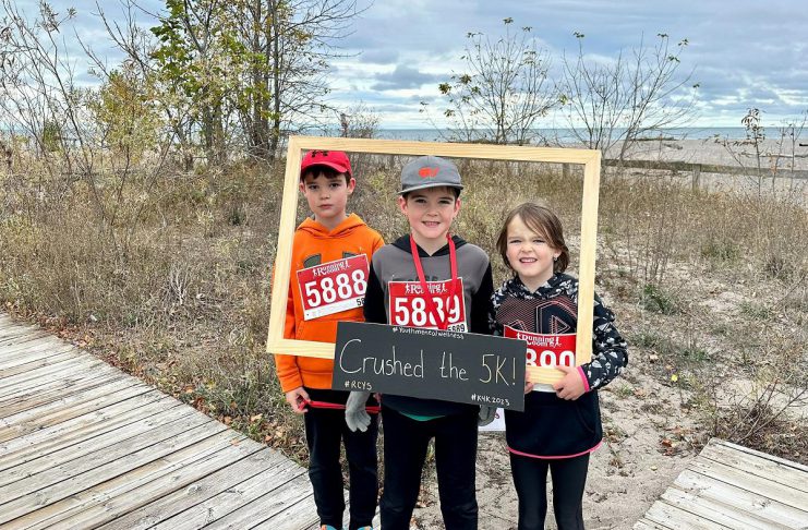 Three young participants along the Cobourg waterfront after last year's 'Kilometers for Kids' fundraising walk and run supporting Rebound Child & Youth Services. This year's event takes place on May 26, 2024 and features five and 10 kilometre routes, with proceeds supporting local mental health services for children and youth and their families. (Photo: Rebound Child & Youth Services)