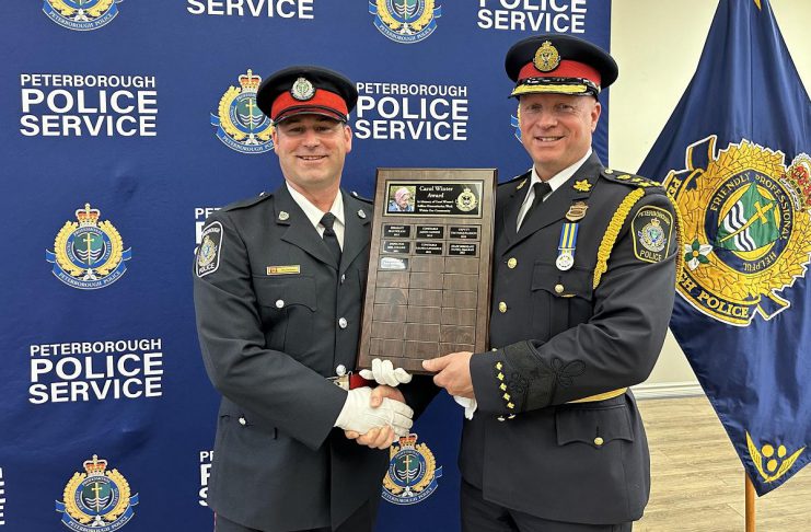 Constable Dan Mundell (left, pictured with Peterborough Police Chief Stuart Betts) received the Carol Winter Humanitarian Award, recognizing a member of the police service who has contributed to the needs of vulnerable people in the community, during the 46th Annual Knights of Columbus Police Appreciation Night on May 15, 2024. (Photo: Peterborough Police Service)