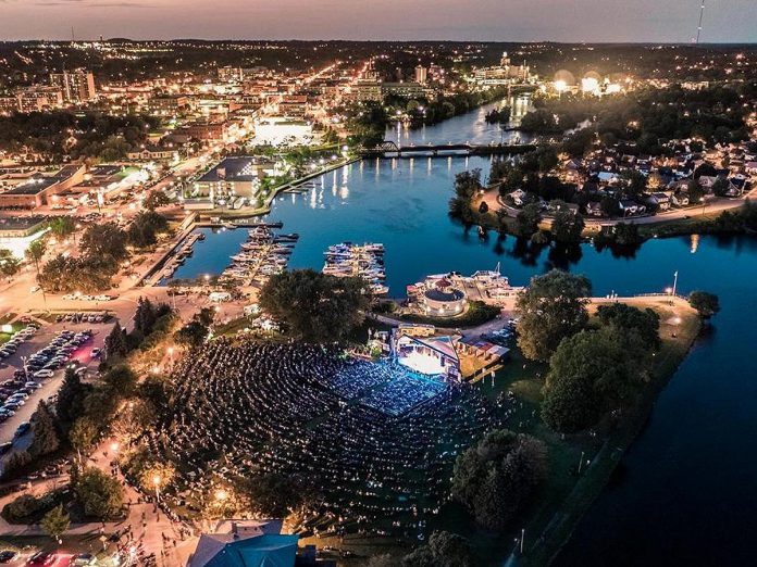 A large crowd at Del Crary Park in downtown Peterborough watches a performance on the former Fred Anderson stage at Peterborough Musicfest, Canada's longest-running free-admission summer concert series. The festival's economic impact has been evaluated at $4.3 million, according to figures recently released by festival organizers. (Photo: Peterborough Musicfest)