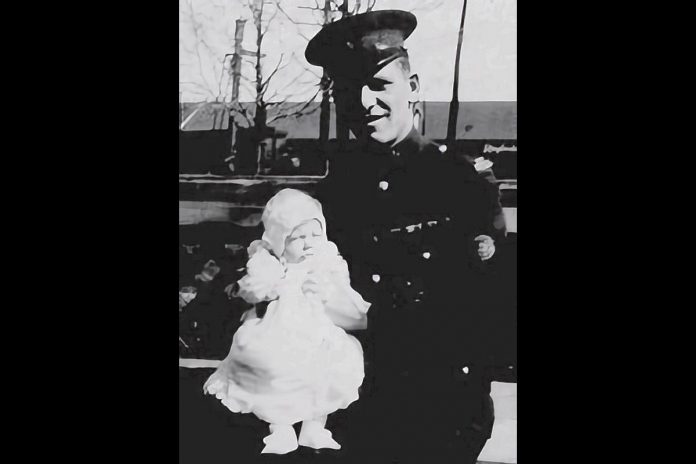 Provincial constable Norman F. Maker with one of his daughters in an undated photo. The 32-year-old officer with Ontario Provincial Police's Peterborough detachment was shot and killed on May 3, 1928 after responding to a report of a man with a gun at a downtown Peterborough hotel. (Photo via Ontario Police Memorial Foundation)