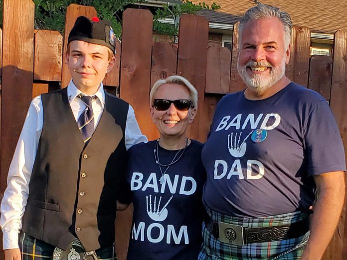 Brodick Ewing's mother and manager Avril created matching T-shirts for herself and Brodick's father Rod and many of the other band families, to show their support from the stands during competitions. (Photo courtesy of Ewing family)