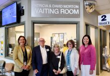 After their family recently suffered a devastating loss due to suicide, Peterborough philanthropists David and Patricia Morton (second and third from left) decided to donate $500,000 to the Peterborough Regional Health Centre (PRHC) Foundation to support mental health and addictions care at the hospital. At a private family event on May 29, 2024, new signage was unveiled at the hospital's emergency department waiting room in honour of their gift. Also pictured from left to right is PRHC president and CEO Dr. Lynn Mikula, PRHC's director of mental health and addictions Jennifer Cox, and PRHC Foundation president and CEO Lesley Heighway. (Photo courtesy of PRHC Foundation)