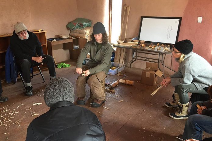 Woodcarver John Wager leading a workshop at Gamiing Nature Centre. Wager is one of the artisan vendors who will be at the Gamiing Nature Centre's Summer Solstice Festival, selling his handcarved spoons and other woodenware, on June 22, 2024. (Photo courtesy of Gamiing Nature Centre)