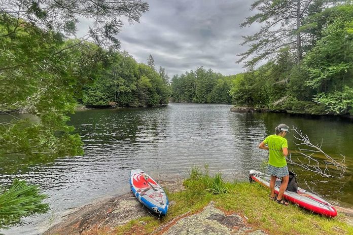 From day and overnight trips to businesses that offer stand-up paddleboard yoga, there are many ways to explore the lakes of the Haliburton Highlands on one of the most popular paddled watercraft. (Photo courtesy of Haliburton Highlands Economic Development & Tourism)