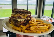 One of the most popular sandwiches served at The Good Baker YPQ is the classic Reuben, made with corn beef, Swiss cheese, sauerkraut, and housemade Thousand Island dressing and served with fries. Brad Katz, who first opened The Good Baker at the YMCA building in downtown Peterborough, is hosting a grand opening celebration of his second location at the Peterborough Airport on June 15 and 16, 2024. With mini cupcakes and discounts available, diners can enter a ballot to win passes for local businesses and a free one-hour sightseeing flight. (Photo courtesy of The Good Baker YPQ)