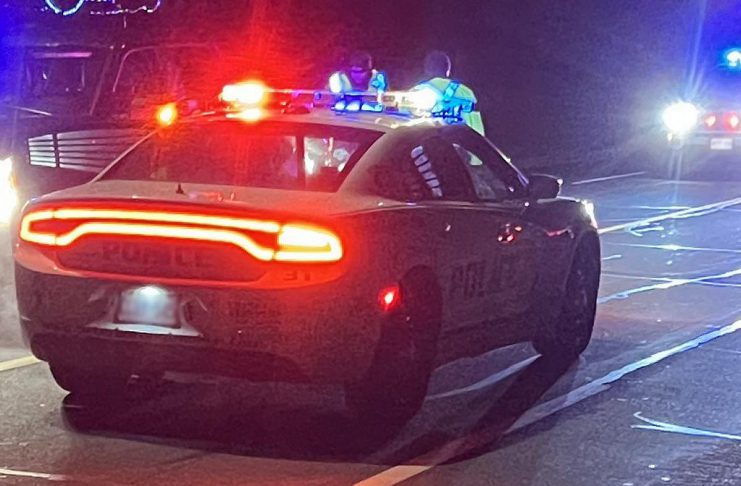 A Peterborough police car with lights flashing at night. (Photo: Peterborough Police Service)