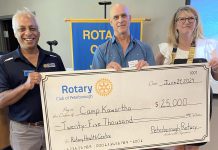 Rotary assistant district governor Atul Swarup (left) and outgoing Rotary Club of Peterborough president Betty Halman-Plumley presented a $25,000 cheque to Camp Kawartha executive director Jacob Rodenburg at the club's meeting on June 24, 2024. In 2021, the Rotary Club of Peterborough committed to donate $100,000 to Camp Kawartha to support its new eco-friendly health centre. (Photo courtesy of Rotary Club of Peterborough)