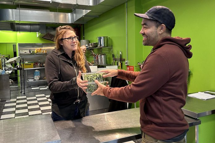 Local food producer Chemong City Greens delivers locally grown microgreens to Peterborough restaurant Fresh Urban Plate. The final phase of the "Growing the Local Food Wholesale Market in the Kawartha Region" project will be the development of a wholesale food hub to act as an efficient aggregation and distribution model for local food. (Photo courtesy of Peterborough & the Kawarthas Economic Development)